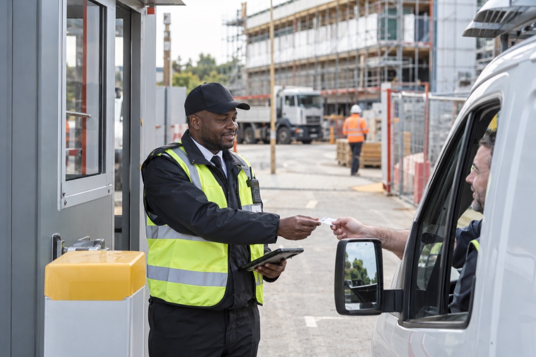 Illustrative uniformed security guard at a site entrance